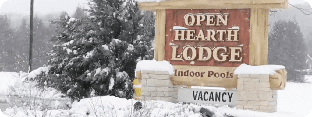 Open Hearth Lodge sign in winter