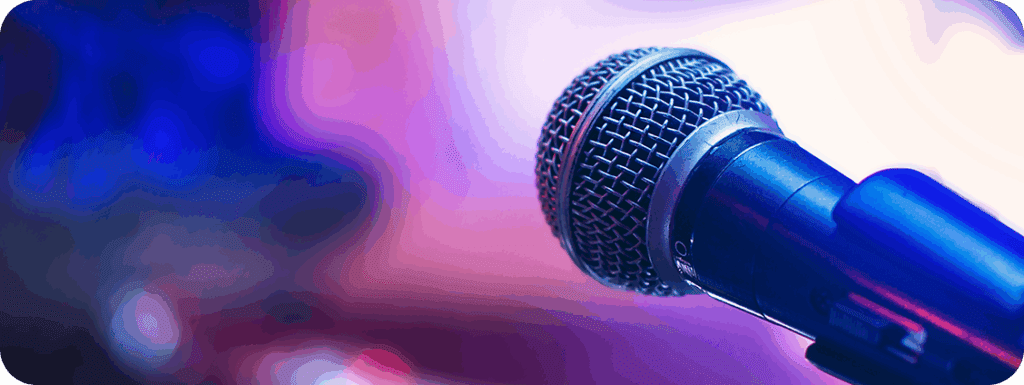 A microphone against a blurred background at a live concert event