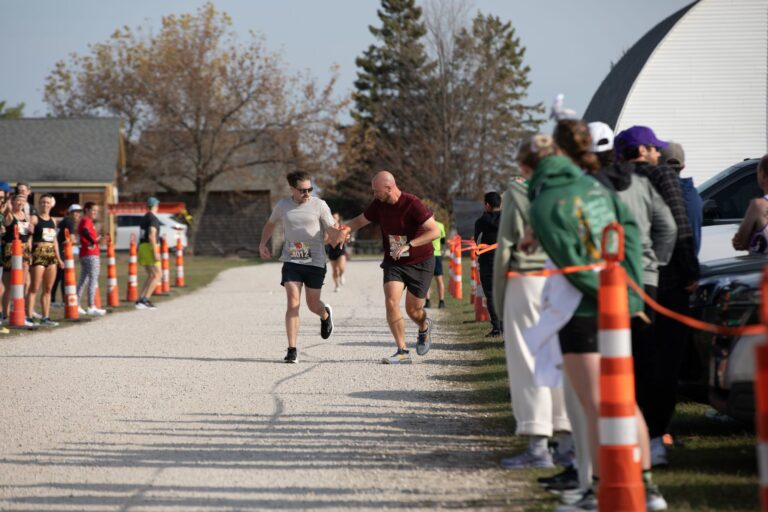 Relay hand-off at Fall 50 Exchange 1 in Ellison Bay