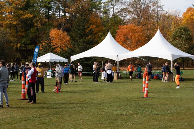 Tents and runners at Fall 50 Exchange 3, Nicolet Bay Beach