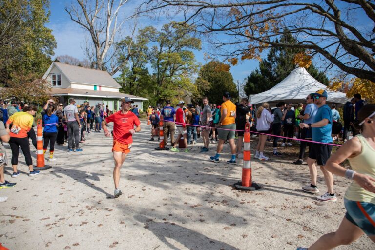 Runner arriving at Fall 50 Exchange 5 in Juddville