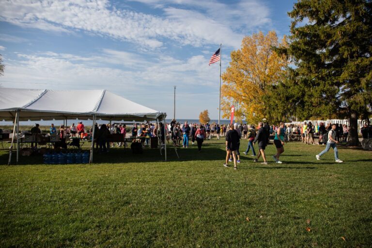 Tent and runners at Fall 50 Exchange 7 in Murphy Park