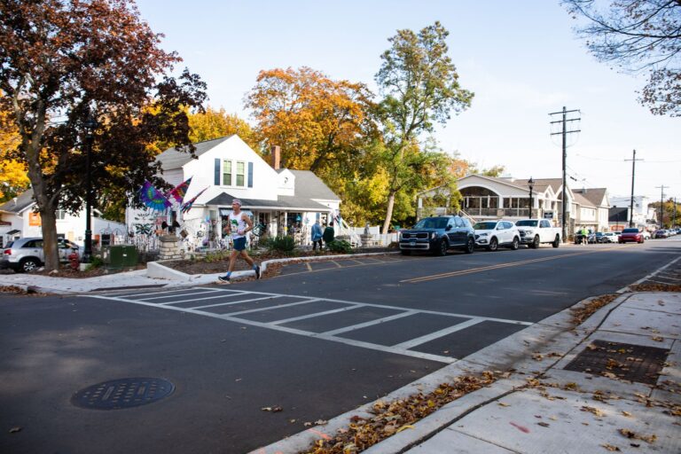 Fall 50 runner on Main Street in downtown Fish Creek