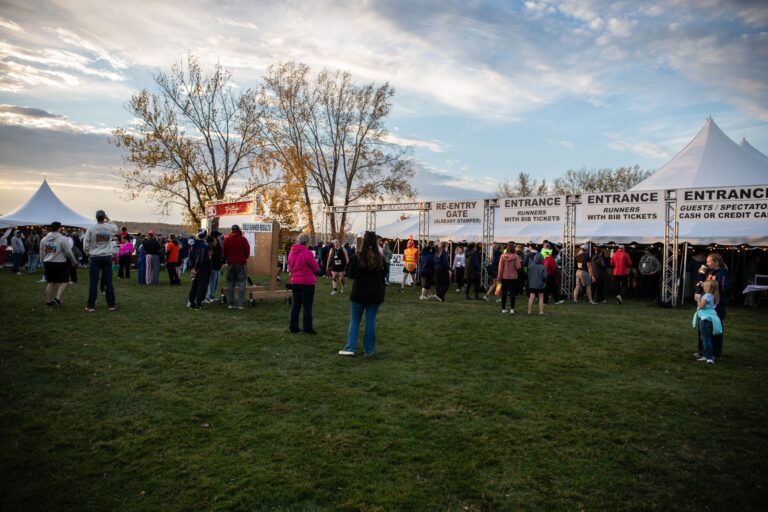 Entrances to the Fall 50 finish party tent at Sunset Park
